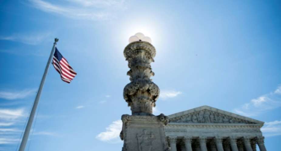 The Supreme Court's latest ruling on President Donald Trump's travel ban was both a setback and a partial victory for the White House.  By Brendan Smialowski AFPFile