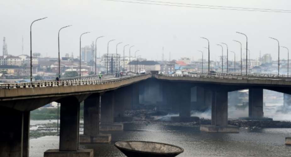 The Third Mainland Bridge is a key link to the city's business district and is going to partially closed for months for repairs.  By PIUS UTOMI EKPEI AFP