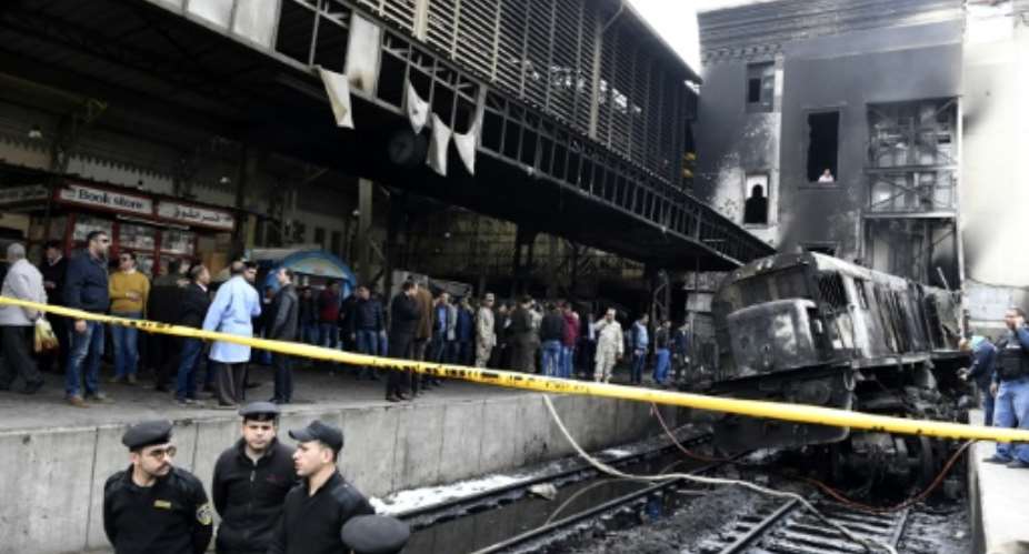 The train crash sparked a major fire at Cairo's Ramses station.  By Khaled DESOUKI AFP