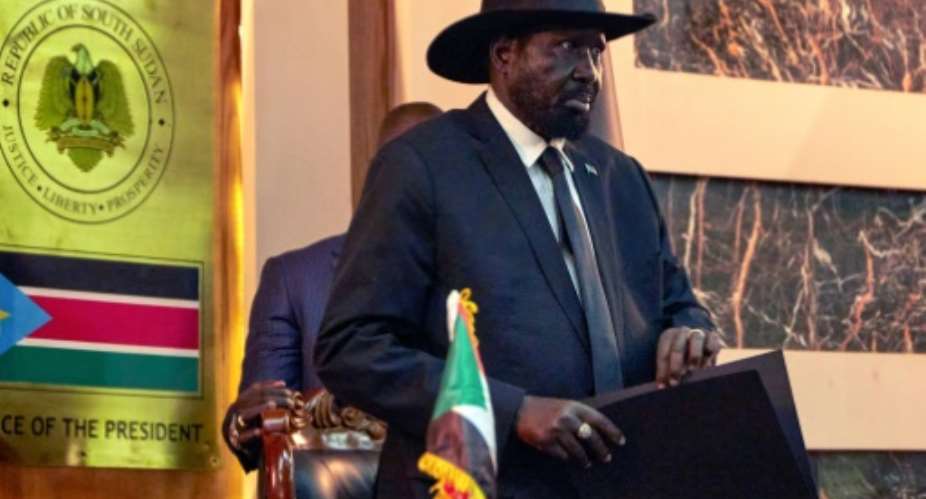 The UN has extended an arms embargo on South Sudan even though President Salva Kiir, seen here, and Riek Machar, the rebel leader who is now first vice president, have made a deal to form a unity government.  By ALEX MCBRIDE AFP
