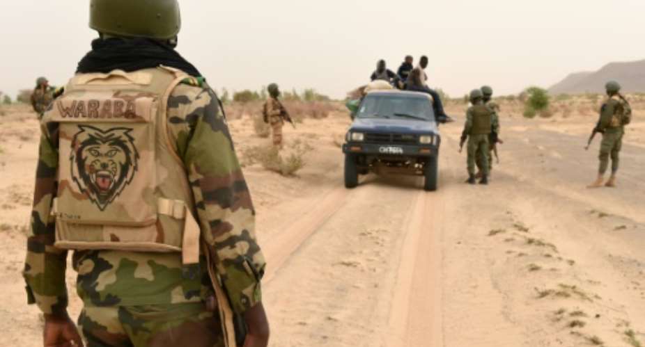 The under-equipped Malian army is struggling to contain jihadists and armed criminal groups in the north and centre despite being backed by French troops and UN peacekeepers.  By PHILIPPE DESMAZES AFPFile