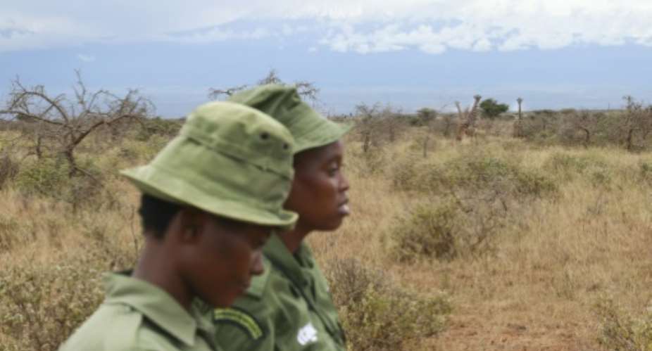 The women rangers are battling deeply entrenched prejudices.  By Tony KARUMBA AFP