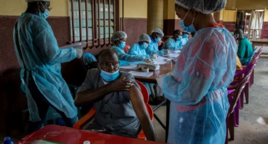 The World Health Organization says more than 1,600 people have already been vaccinated for Ebola in Guinea since the latest outbreak.  By CAROL VALADE AFPFile