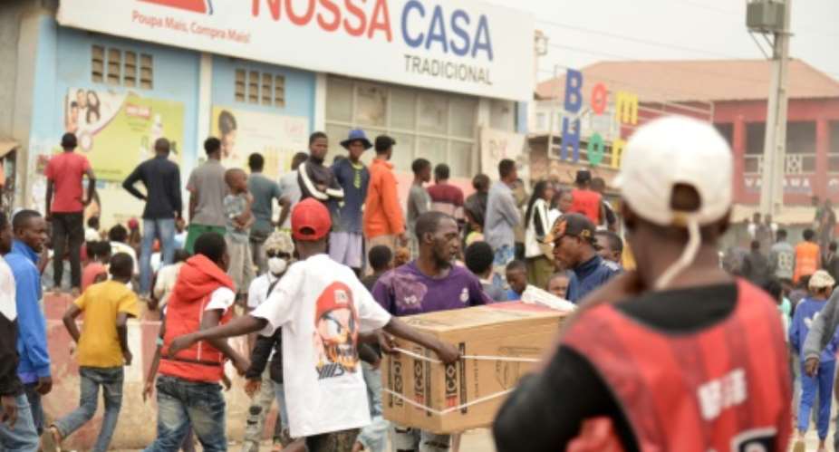 There was widespread looting in Luanda on the first day of the strike.  By - (AFP/File)