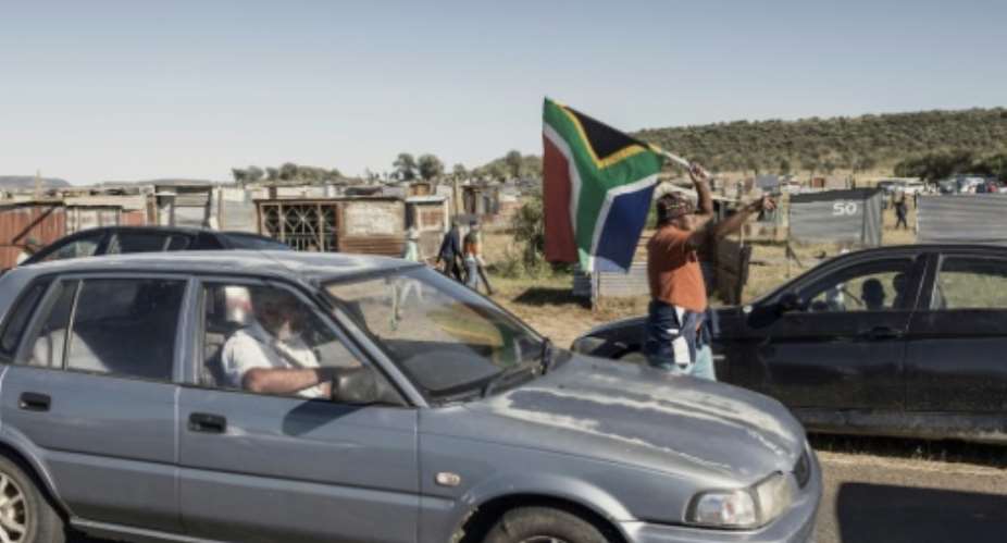 There were clashes on the outskirts of the South Afrian city of Bloemfontein on Tuesday between police and local residents angry that squatters have begun to construct a shantytown.  By MARCO LONGARI AFP