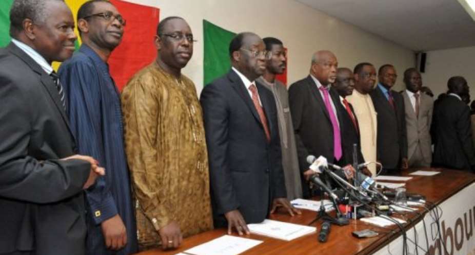 Eight members of the Senegalese opposition at a news conference in Dakar last month.  By Seyllou AFP
