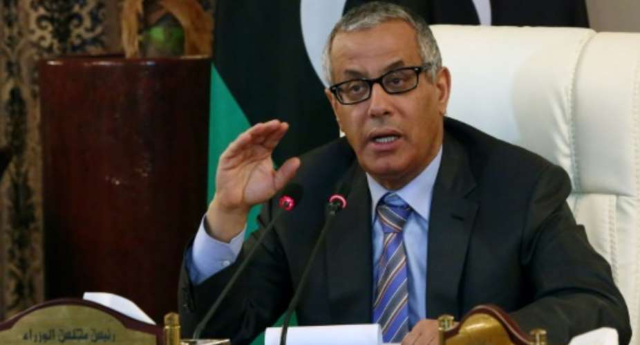 This photo taken on July 24, 2013 shows former Libyan prime minister Ali Zeidan during a press conference in the  Tripoli.  By MAHMUD TURKIA AFPFile