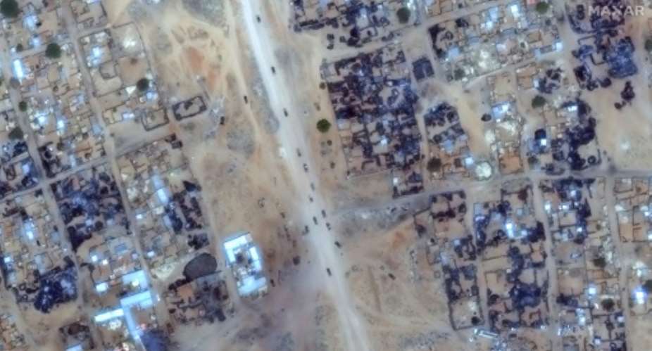 This satellite image released by Maxar Technologies shows blackened buildings in Darfurs Zamzam camp as Sudanese paramilitaries move through..  By - (Satellite image 2025 Maxar Technologies/AFP)