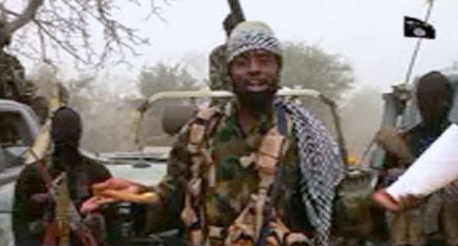 This screen grab image taken on December 29, 2016 from a video released on Youtube by Islamist group Boko Haram shows Boko Haram leader Abubakar Shekau making a statement at an undisclosed location.  By HO BOKO HARAMAFPFile