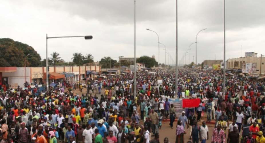 Thousands marched in Lome this week in rival demonstrations over the rule of President Faure Gnassingbe, the scion of Africa's oldest political dynasty.  By MATTEO KOFFI FRASCHINI AFPFile