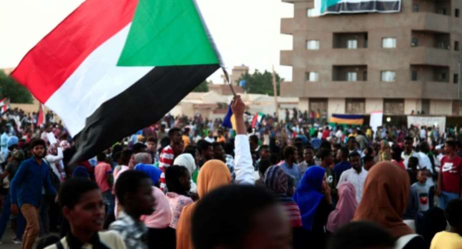 Thousands of Sudanese rallied late last month in several cities, urging the new authorities to dissolve the former ruling party.  By EBRAHIM HAMID AFPFile