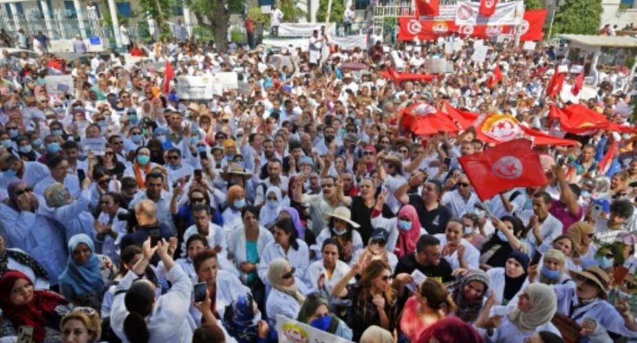 Thousands of Tunisian public health workers protested in front of the health ministry in the capital Tunis.  By FETHI BELAID AFP