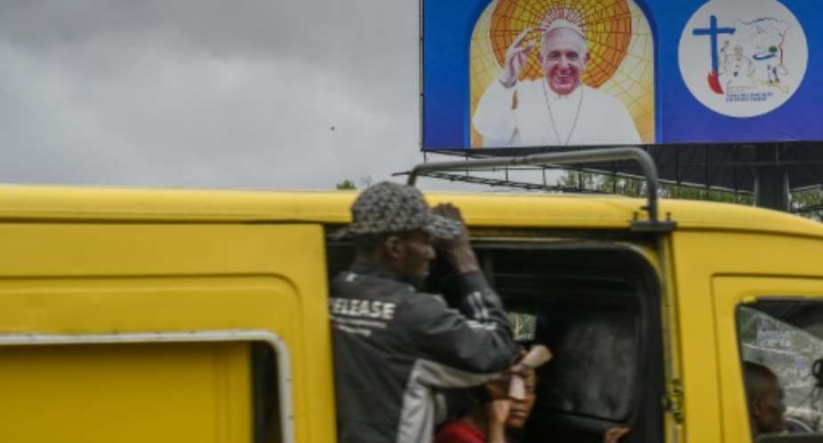 Thousands of well-wishers are expected at Kinshasa's  international airport to greet the 86-year-old pope.  By Arsene Mpiana AFPFile