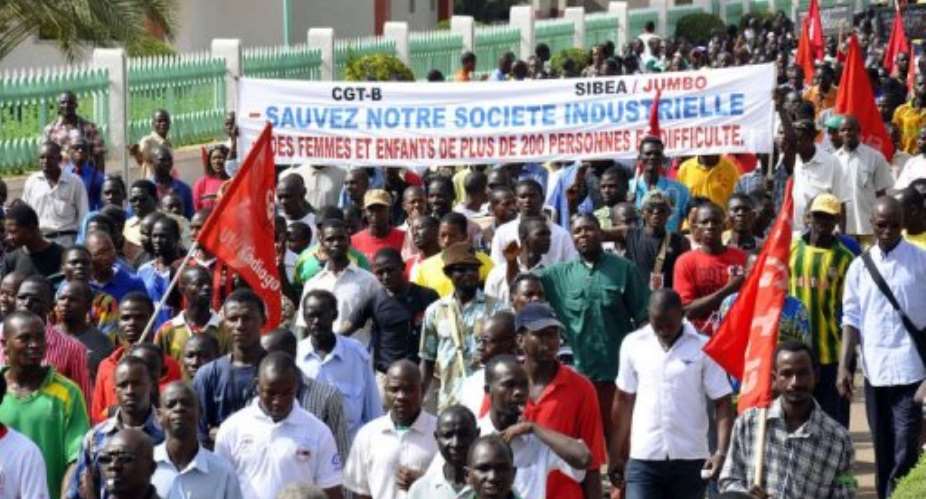 People demonstrate against the high cost of living in the streets of Ouagadougou.  By Ahmed Ouoba (AFP)