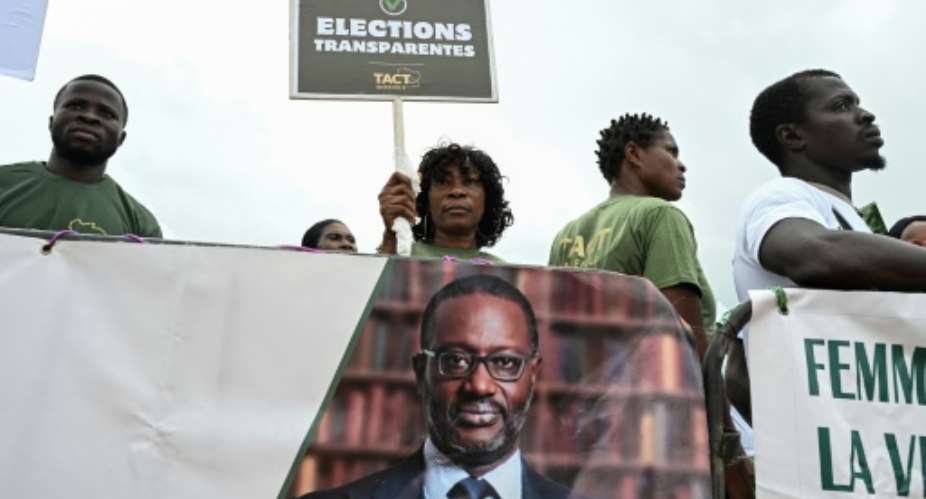 Tidjane Thiam, leader of the main opposition Democratic Party of Ivory Coast, is one of four leading opposition figures excluded from standing in October presidential polls.  By Sia KAMBOU (AFP/File)