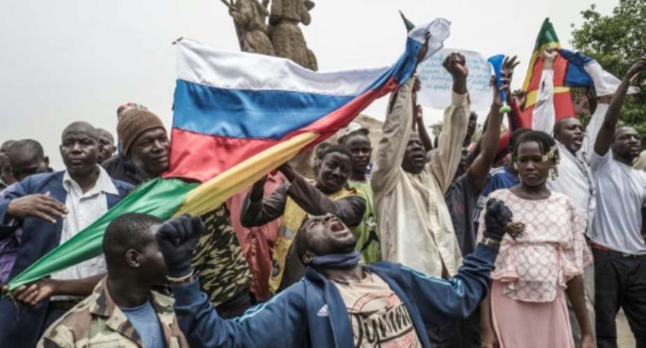 To Russia with love: Protestors in Bamako.  By Michele Cattani AFP