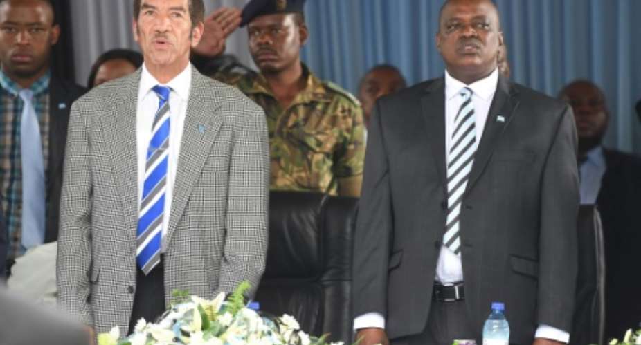 Together and apart: Ian Khama, left, hand-picked his deputy, Mokgweetsi Masisi, right, to succeed him as president. The pair have now publicly fallen out.  By MONIRUL BHUIYAN AFP