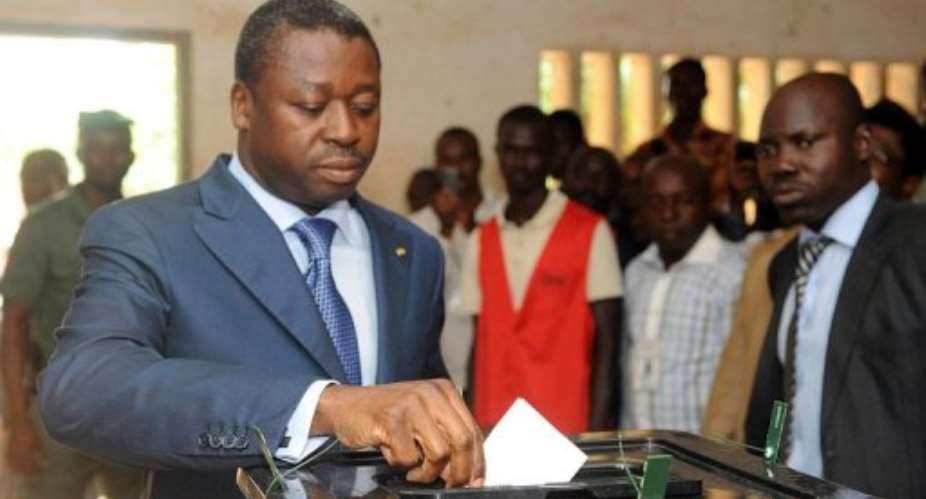 Togolese President Faure Gnassingbe votes in Lome on July 25, 2013.  By Pius Utomi Ekpei AFPFile