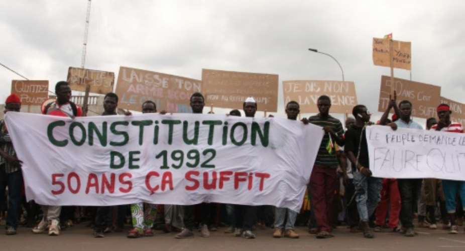 Togolese opposition supporters display a banner reading Constitution of 1992, 50 years is enough, referring to the long rule of the Eyademas, Africa's oldest political dynasty.  By MATTEO KOFFI FRASCHINI AFPFile
