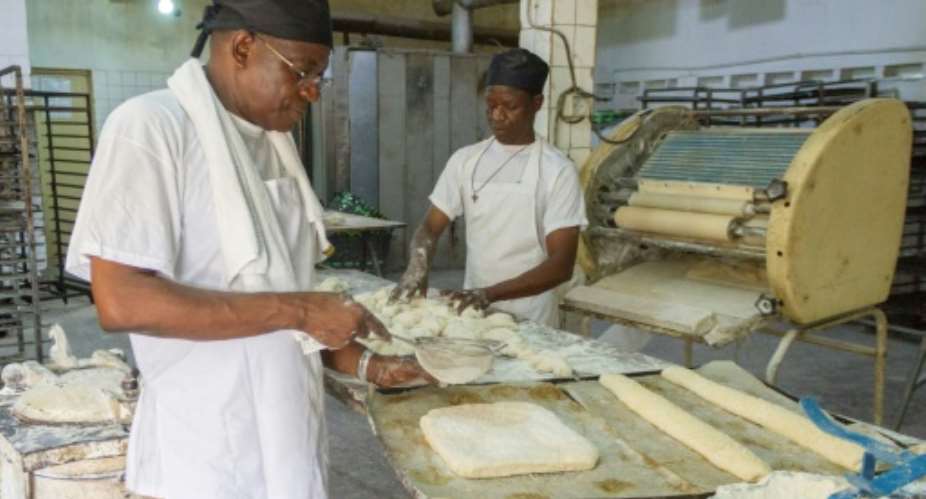 Togo's king of bread, Bonaventure Boma, at work in in one of his bakeries in Lome.  By YANICK FOLLY AFPFile