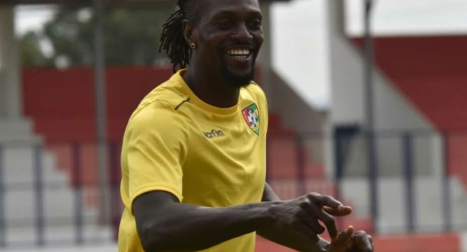 Togo's national football team player Emmanuel Adebayor L is pictured during a training session on January 18, 2017 in Btam, as part of the 2017 Africa Cup of Nations football tournament in Gabon.  By ISSOUF SANOGO AFP