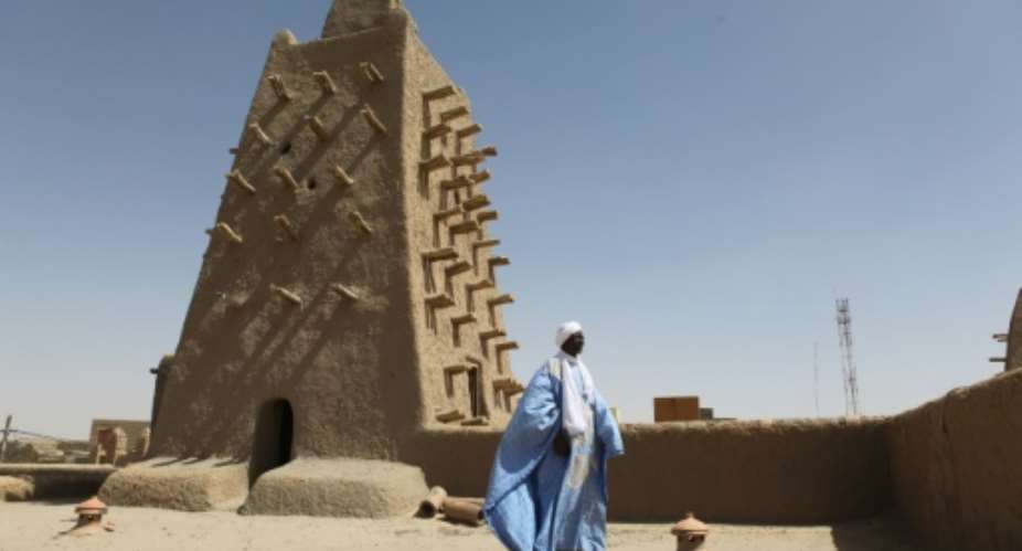 Tombs in Timbuktu's ancient Djingareyber mosque were targeted in the 2012 rampage. The city's fabled mausoleums have now been fully restored, using traditional methods.  By SBASTIEN RIEUSSEC AFP