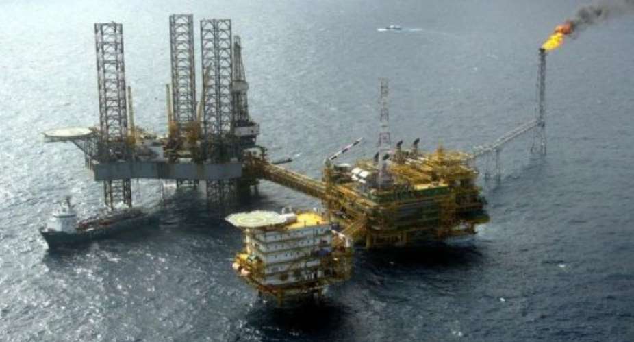 View of a Total Nigeria offshore oil and gas production platform in the Niger delta.  By Pius Utomi Ekpei AFPFile