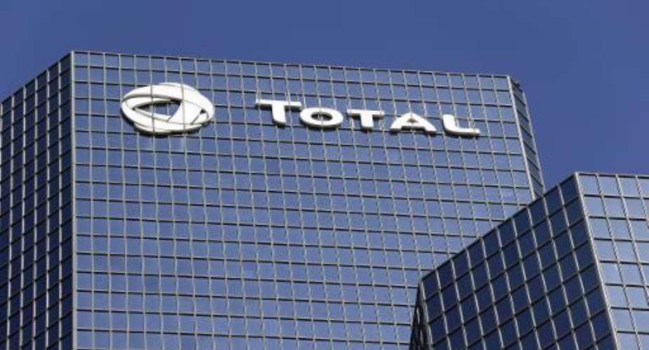 Headquarters of French oil giant group Total at La Defense business district in Paris, September 04, 2013.  By Kenzo Tribouillard AFPFile