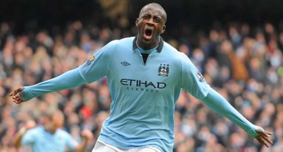 In a picture taken on February 24, 2013 Manchester City's Yaya Toure celebrates scoring against Chelsea at the Etihad Stadium in Manchester, northwest England.  By Andrew Yates AFPFile