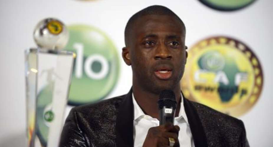Ivorian skipper Yaya Toure speaks after receiving the CAF African Footballer of the Year Award in Lagos on January 8, 2015.  By Pius Utomi Ekpei AFPFile
