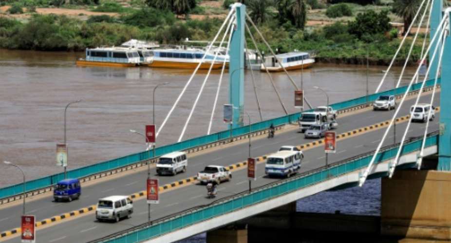 Traffic flows normally across the Mek Nimr Bridge linking Khartoum with Khartoum North, despite the reported coup attempt in the early hours.  By ASHRAF SHAZLY AFP
