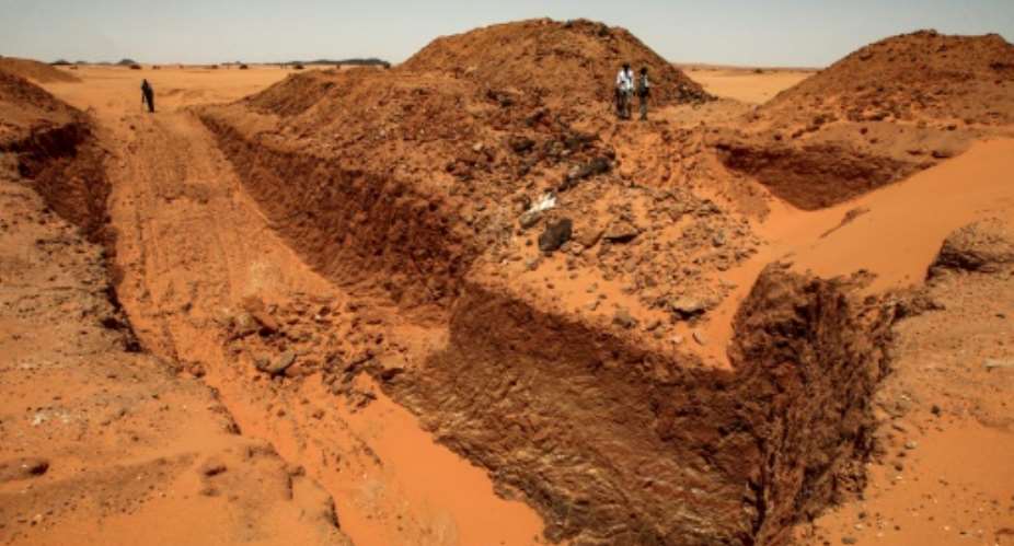 Treasure hunters looking for gold in Sudan have destroyed ancient sites using diggers.  By Ebrahim HAMID AFP Photo