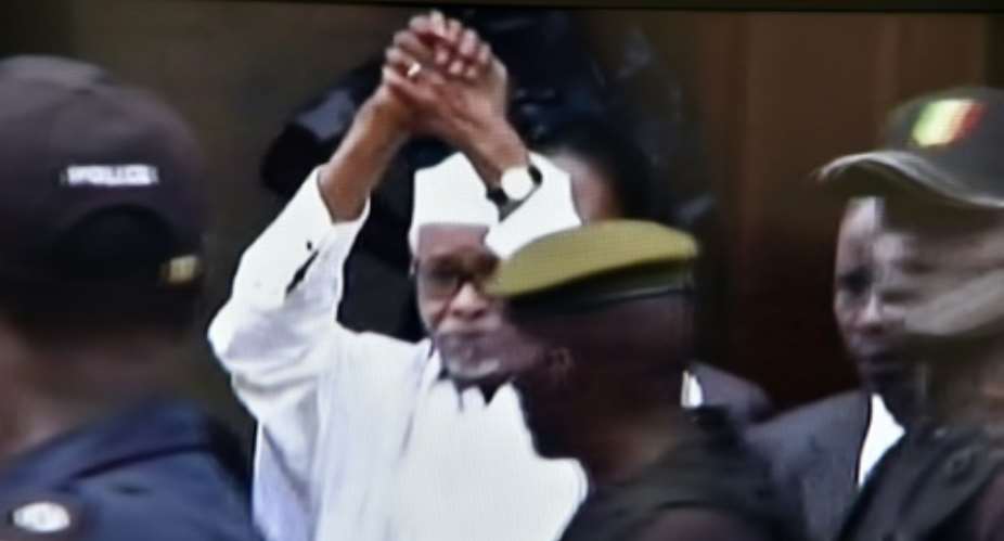 Former Chadian dictator Hissene Habre cried Allah akbar God is greatest as he was escorted into the Extraordinary African Chambers in Dakar on July 20, 2015 to face charges of crimes against humanity.  By Issouf Sanogo AFP