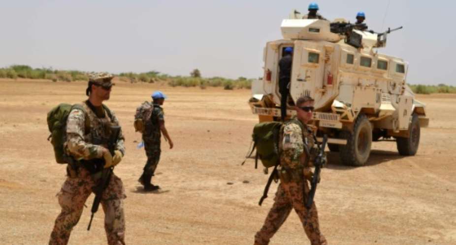 Troops from Canada will join those from other countries including Germany, pictured on duty with the MINUSMA mission in Mali, when they join the UN's peackeeping operation there.  By Souleymane AG ANARA AFP