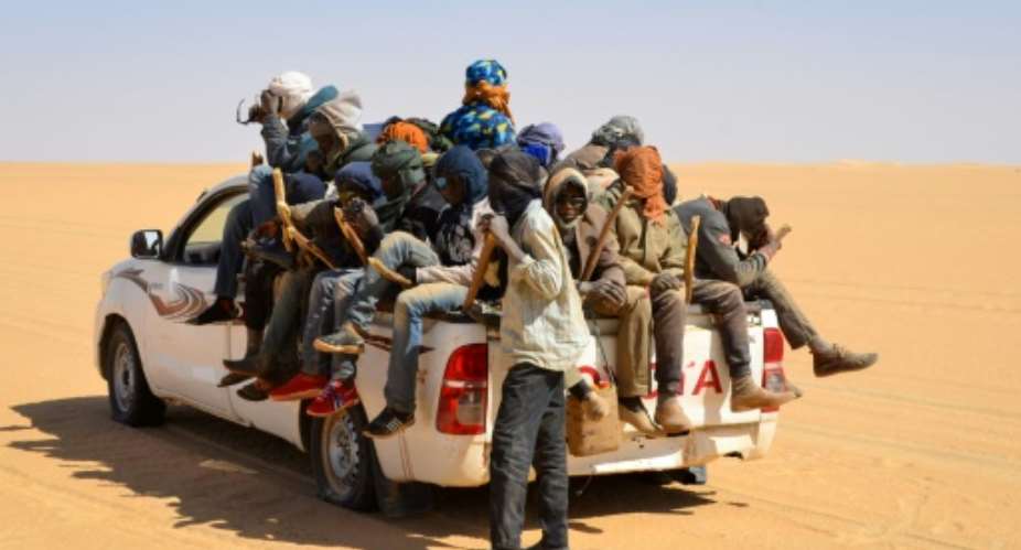 Trucks carrying migrants north frequently breakdown in the desert or become lost, with smugglers sometimes abandoning people to their fates.  By SOULEMAINE AG ANARA (AFP)