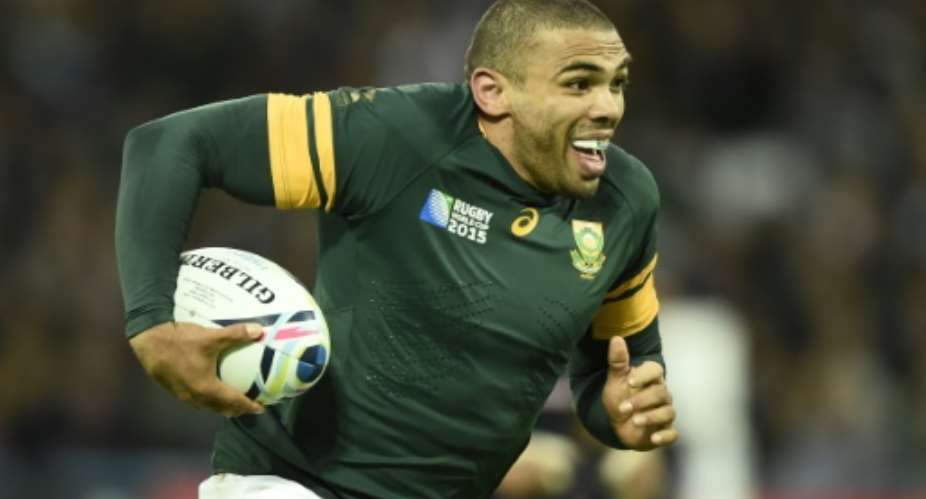 South Africa's wing Bryan Habana runs to score his second and his team's sixth try during a Pool B match of the 2015 Rugby World Cup between South Africa and USA at the Olympic Stadium, east London, on October 7, 2015.  By Lionel Bonaventure AFP