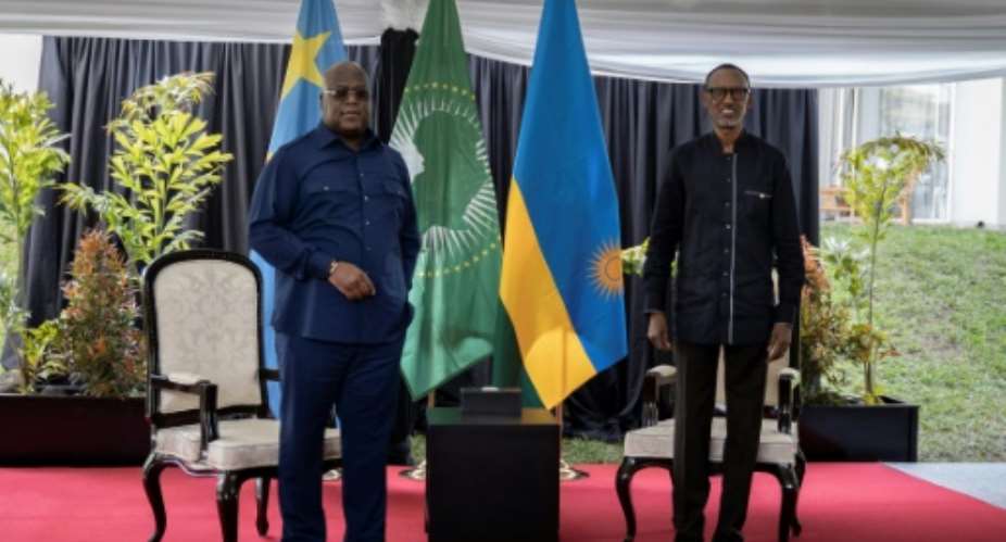Tshisekedi, left, and Kagame pictured at talks in Rubavu, Rwanda, in June 2021.  By Simon Wohlfahrt AFPFile