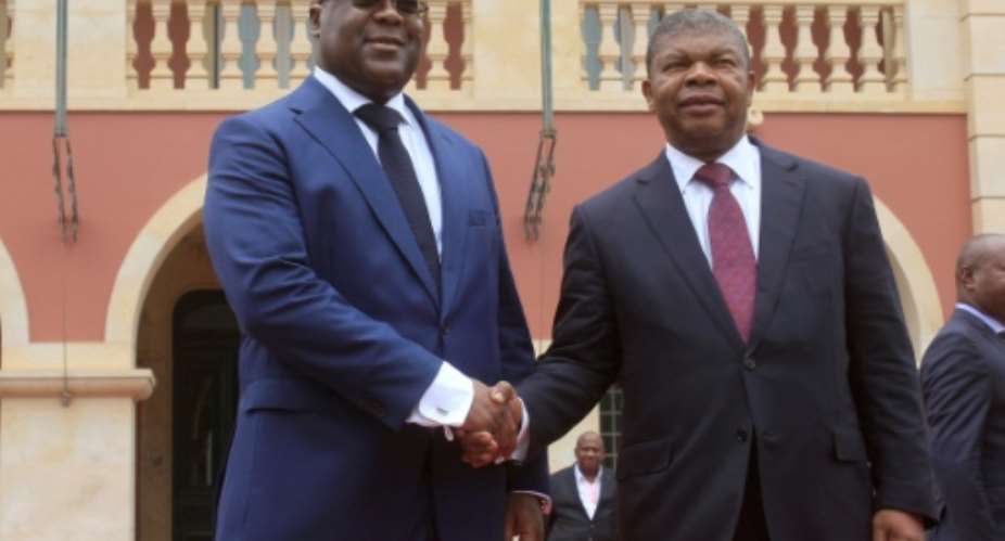 Tshisekedi, left, shown here with his Angolan counterpart Joao Lourenco, admitted to