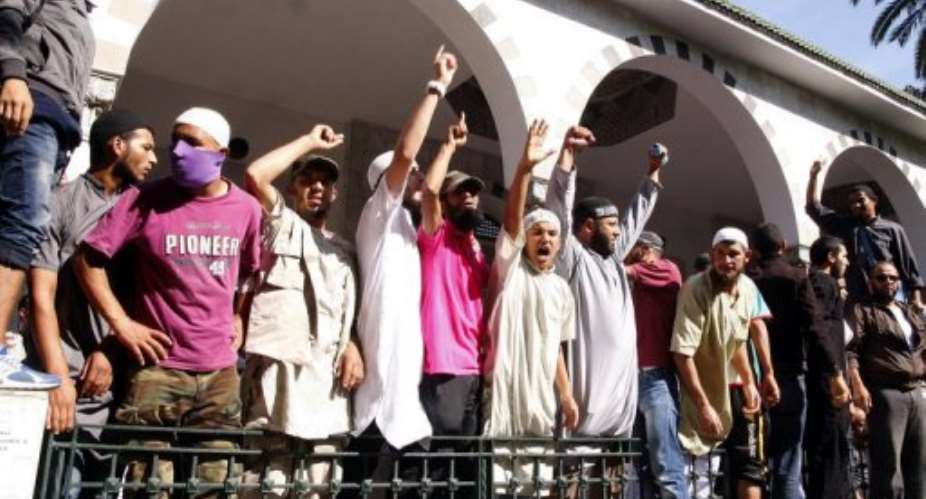 Tunisian Salafists shout slogans outside the El-Fath mosque in Tunis on September 17.  By Salah Habibi AFPFile
