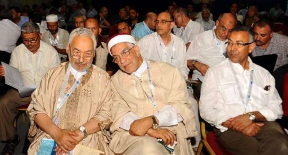 Ennahdha Islamist party founder Rached Ghannouchi Front L sits alongside Ennahdha co-founder Abdelfattah Mourou C.  By Fethi Belaid AFP