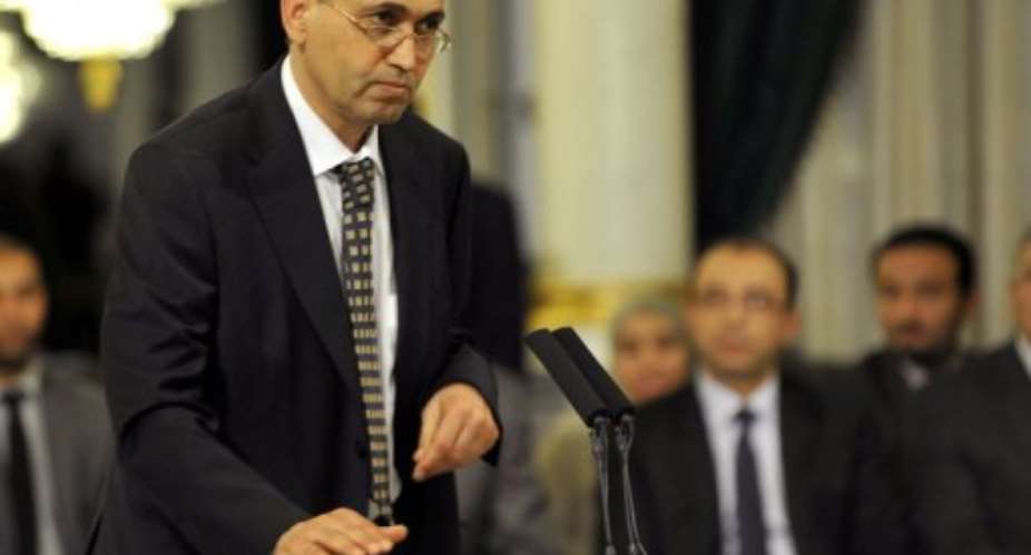 Tunisian Education Minister Salem Labiadh takes an oath of office on March 13, 2013 at the Carthage Palace in Tunis.  By Fethi Belaid AFPFile