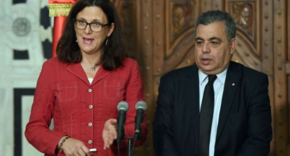 European Trade Commissioner Cecilia Malmstroem gives a press conference with Tunisia's Trade Minister Ridha Lahouel on October 13, 2015 in Tunis.  By Fethi Belaid AFP