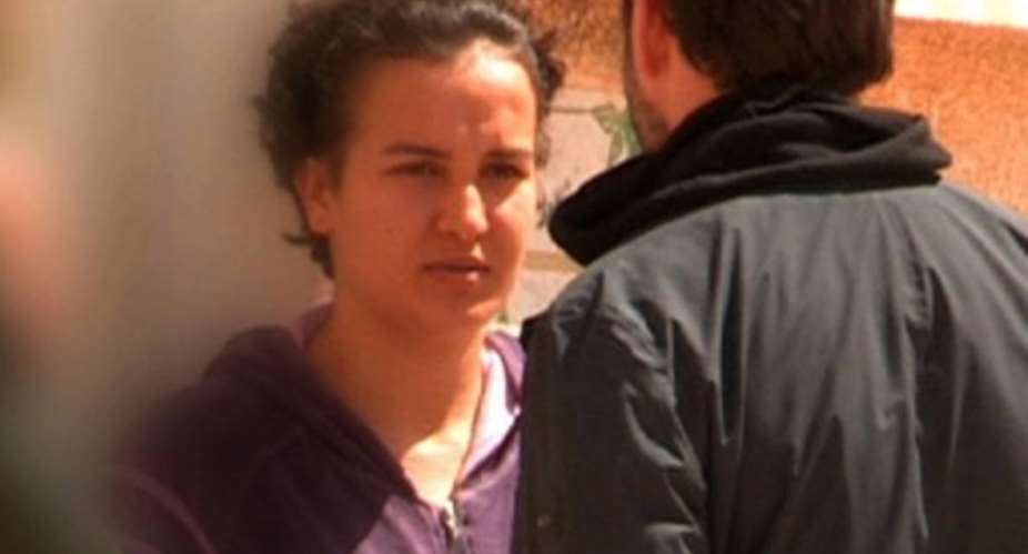 A photo obtained on April 6, 2013, from Capa TV shows a screen grab of Amina Tyler (L) at an undisclosed location.  By  (CAPA TV/AFP/File)