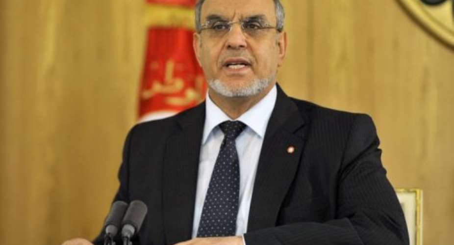 Tunisian Prime Minister Hamadi Jebali speaks during a press conference on January 26, 2013 in Tunis.  By Fethi Belaid AFP