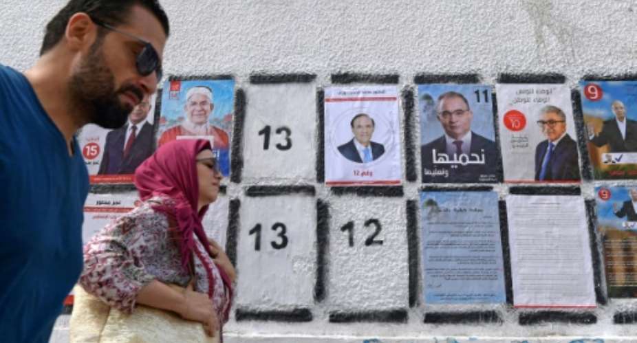 Tunisia has been praised for its democratic progress since the Arab Spring, but the process faces challenges.  By FETHI BELAID AFPFile