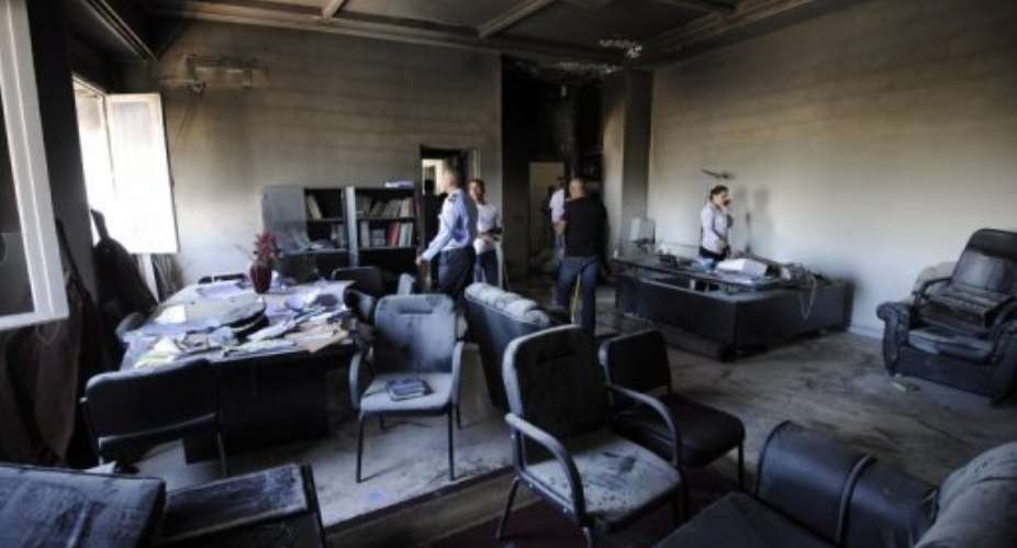 The state prosecutors office in Tunis, which was torched during the spate of attacks.  By Fethi Belaid (AFP)
