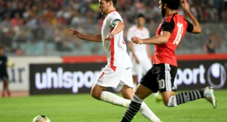 Tunisian forward Youssef Msakni left scored the only goal as Tunisia beat Egypt in the African Cup of Nations CAN 2019 preliminary stage qualification match in Rades on June 11, 2017.  By FETHI BELAID AFP