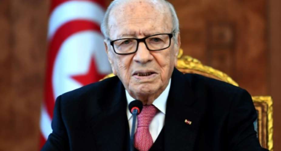 Tunisian President Beji Caid Essebsi at a meeting with political parties, unions and employers on January 13, 2018 to discuss the unrest.  By FETHI BELAID AFP