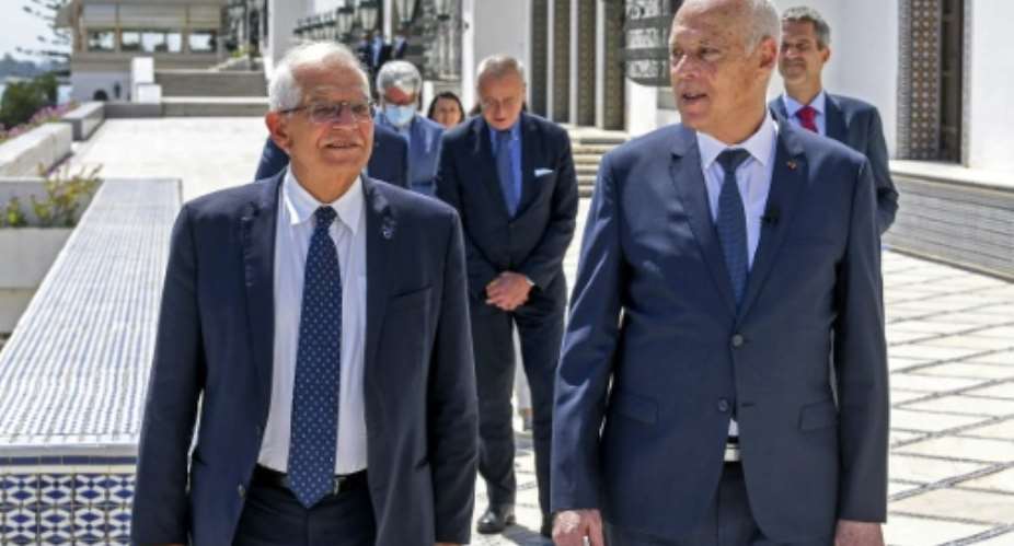 Tunisian President Kais Saied R receives European Union foreign policy chief Josep Borrell at Carthage Palace in the capital Tunis.  By STRINGER TUNISIAN PRESIDENCYAFP