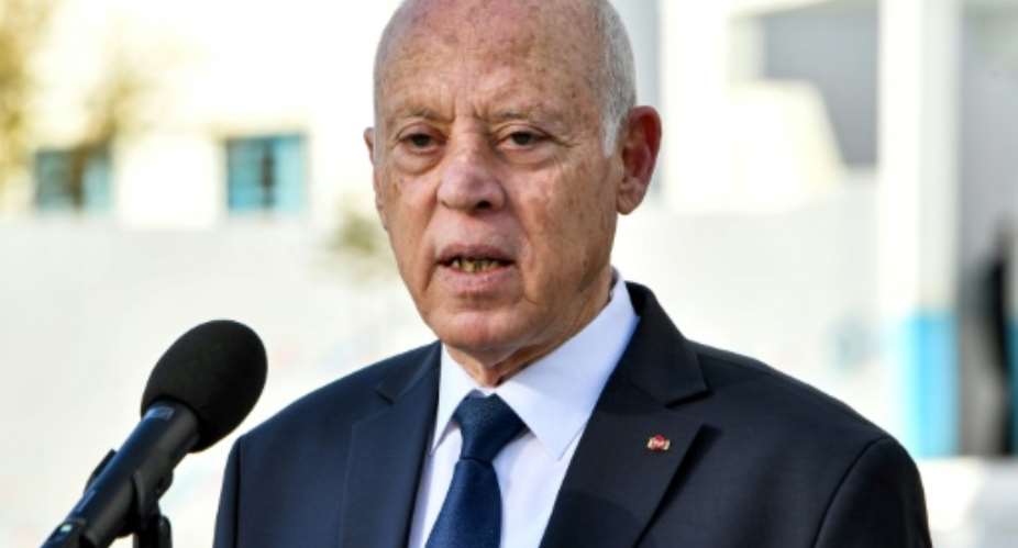 Tunisian President Kais Saied, who grabbed wide-ranging powers two years after his 2019 election, says he will run for a new term in October.  By FETHI BELAID (AFP/File)